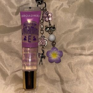 Purple Lip Gloss with Vitamin E and charm